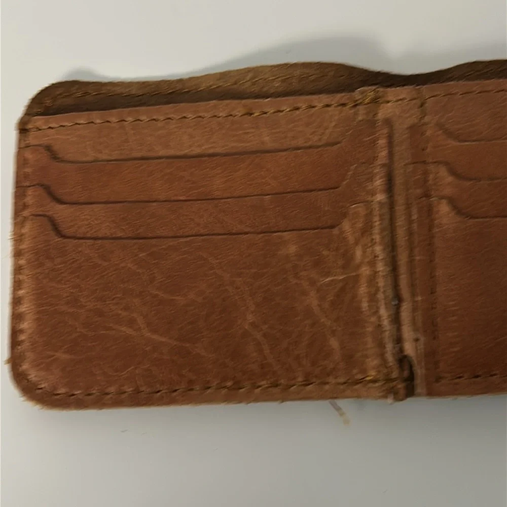 Brown Leather Bifold Wallet with Antelope Logo Rugged Safari-Inspired Style
